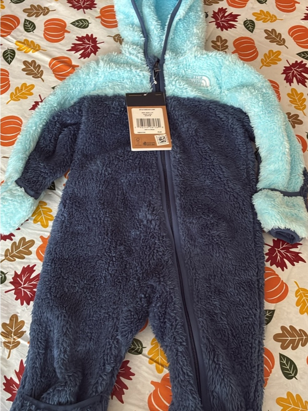 The North Face Plush Hooded One-Piece in Light Blue & Navy